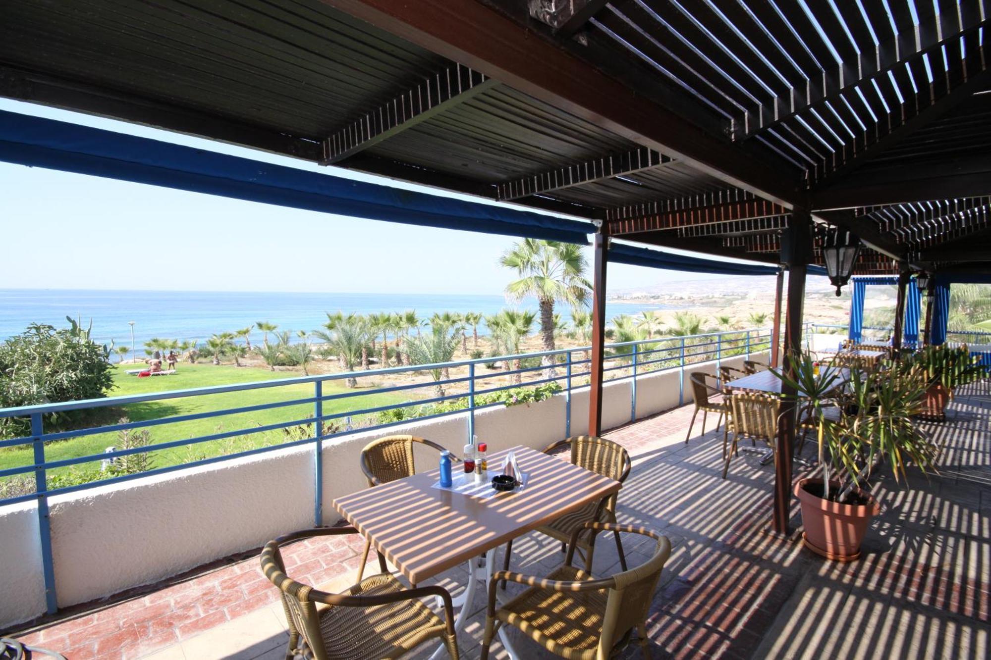 Helios Bay Hotel&Suites Klorakas Restaurante foto